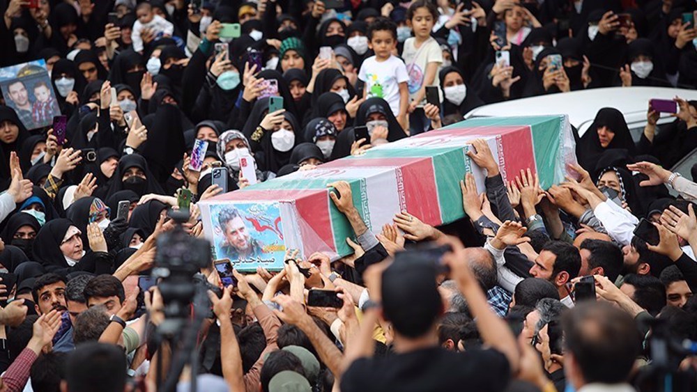 Iranians hold funeral for IRGC member assassinated in Tehran