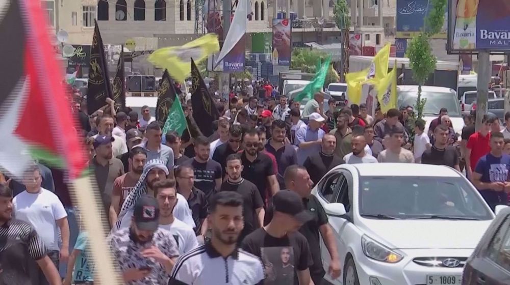 Palestinians hold massive funeral for teenager killed by Israeli forces
