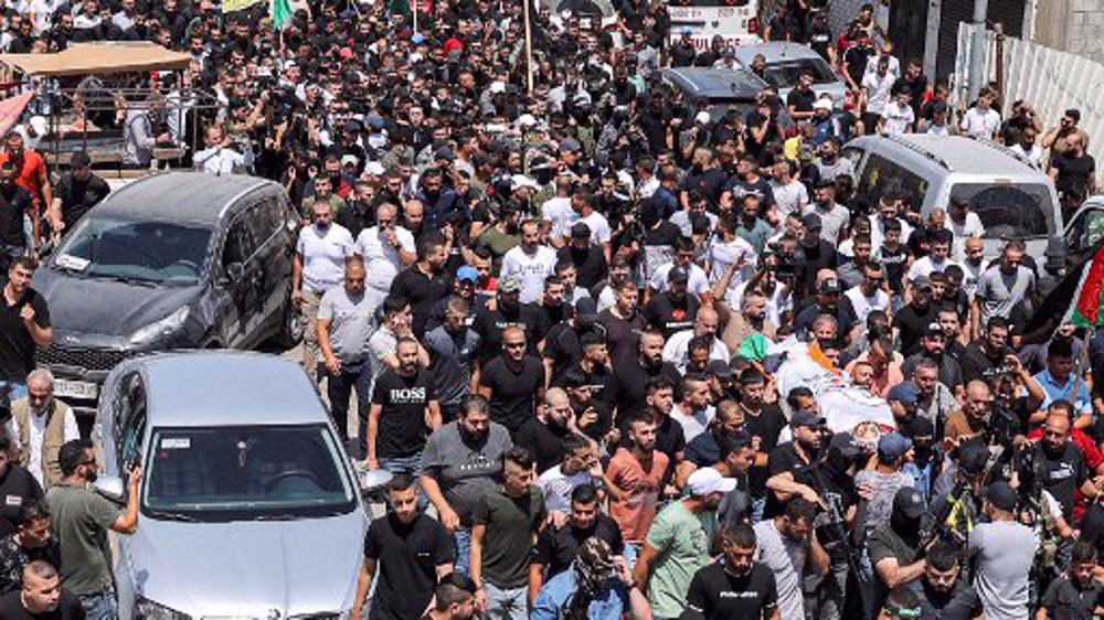 Palestinians hold funeral of three young men killed by Israeli forces