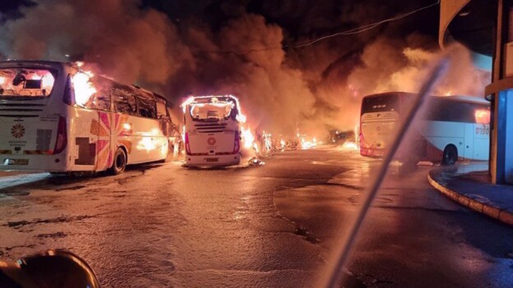 Two buses burnt down at Israeli parking lot south of Tel Aviv