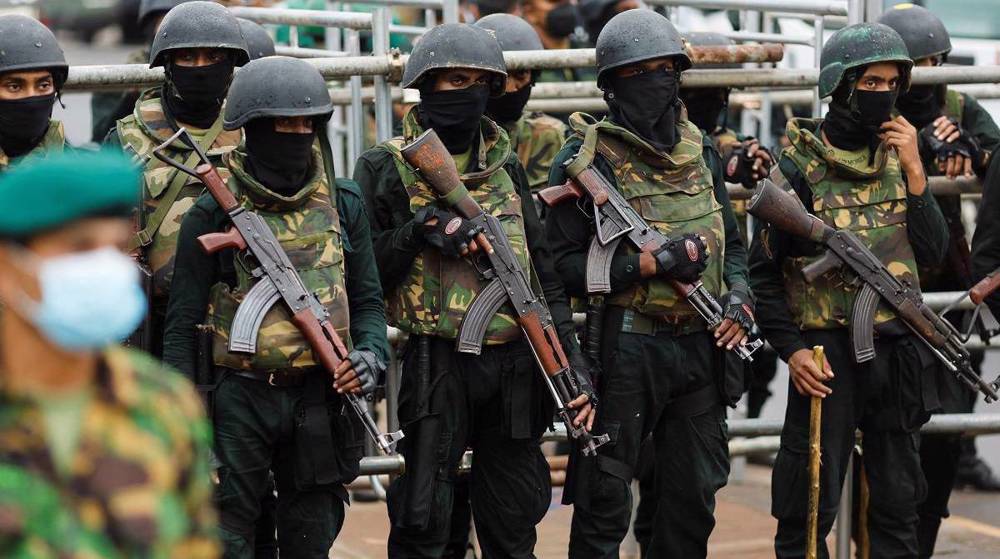 Sri Lankan police clear main protest site as new PM takes over