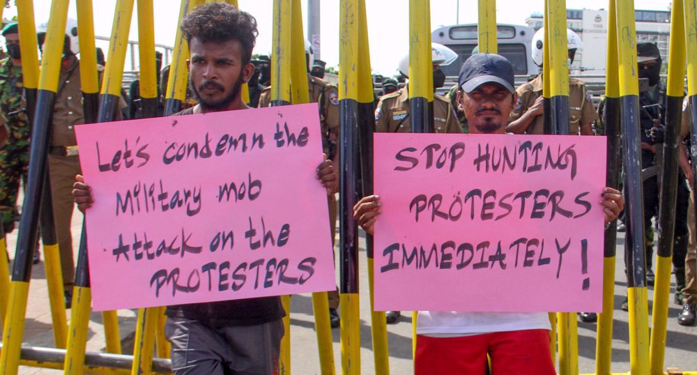 Sri Lanka arrests protest leaders, as parliament extends state of emergency