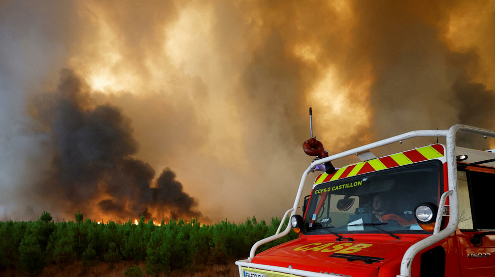 Wildfires rage in France, thousands evacuated from homes