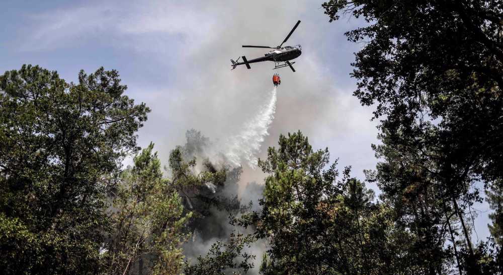 Firefighters continue to battle blazes as wildfires rage on in southeast France 