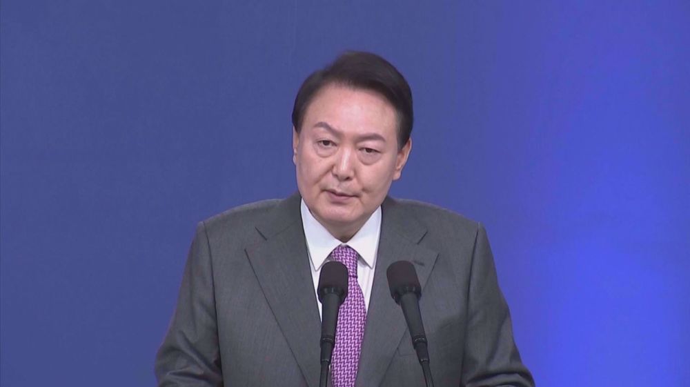 North Korea tests missile as South Korean President offers conditional aid