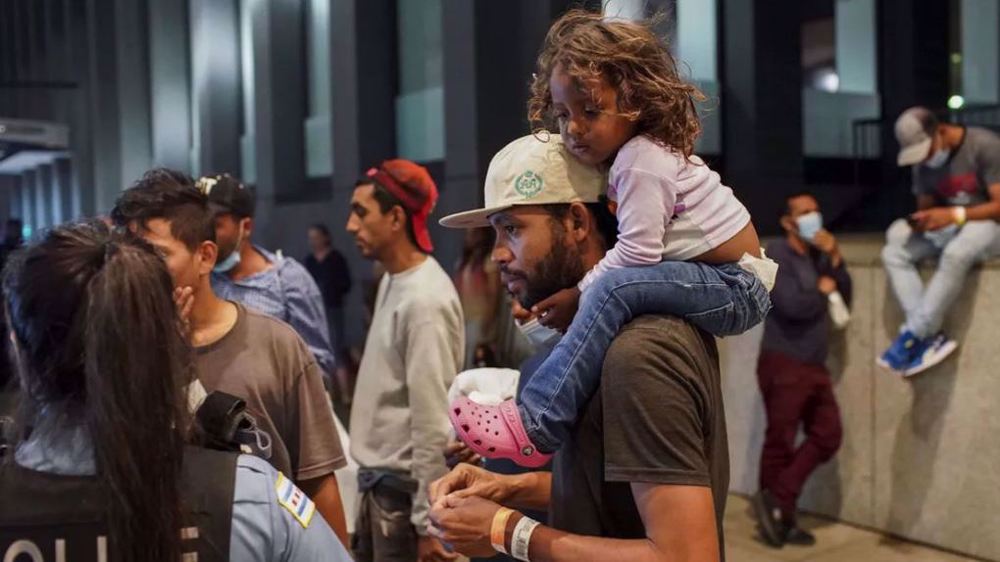 Asylum-seekers bussed from Texas arrive in Chicago
