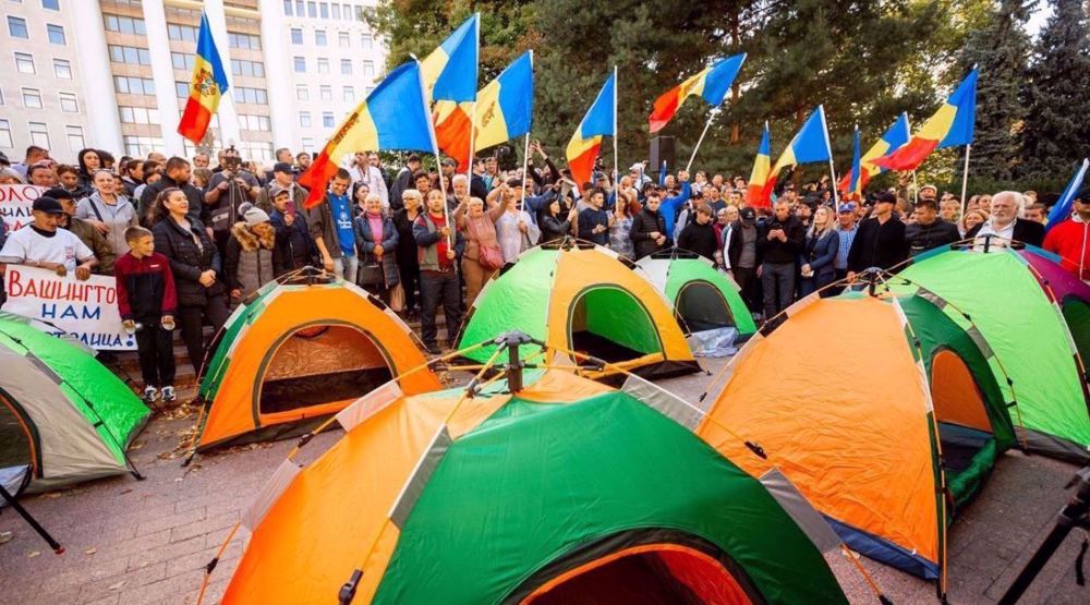 Thousands take to streets in Moldova demanding resignation of pro-West govt.