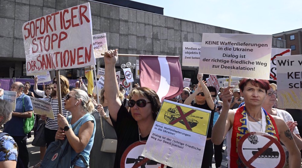Germany-based Russians rally in protest at Western sanctions against Moscow 