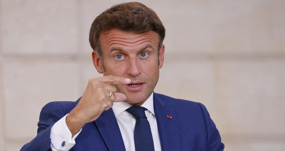 French president urges cuts in energy use to avert rationing