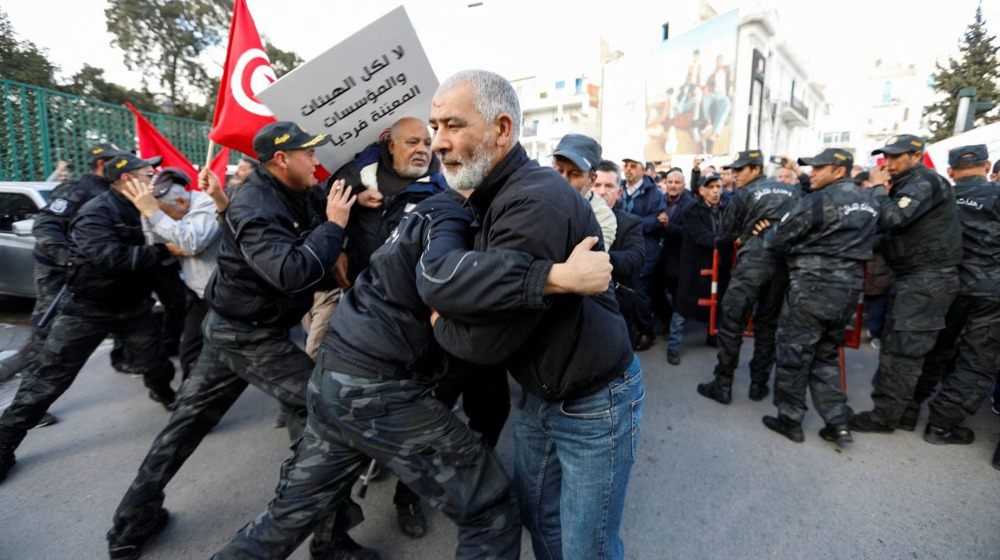 Tunisians rally against President Saied on uprising anniversary 