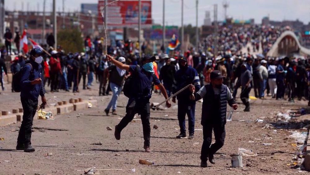 Peru police fire tear gas at protesters after president calls for 'truce'