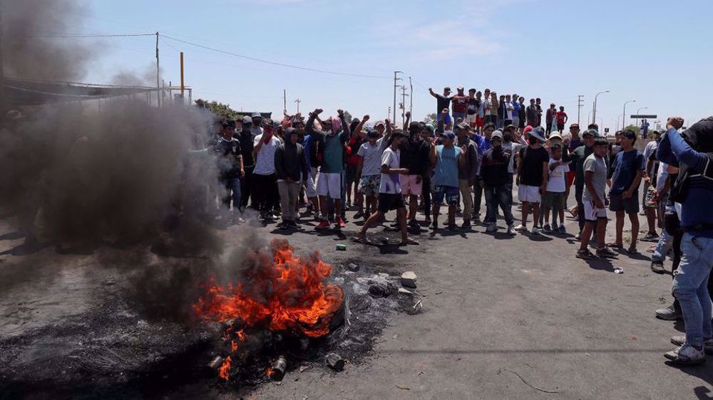 Peruvians rally to call for president's resignation, clash with police