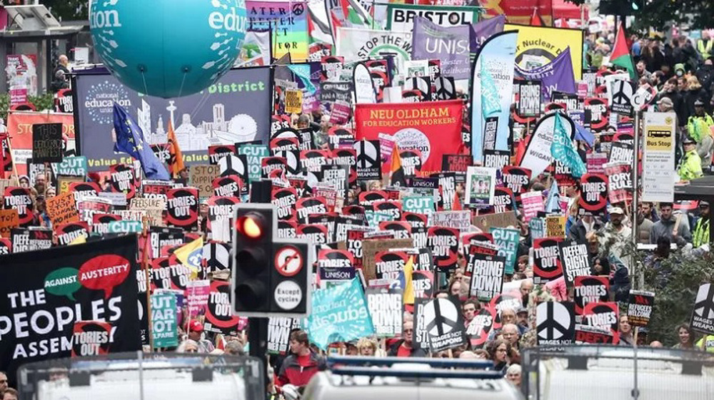 Thousands protest during Tory Party Conference