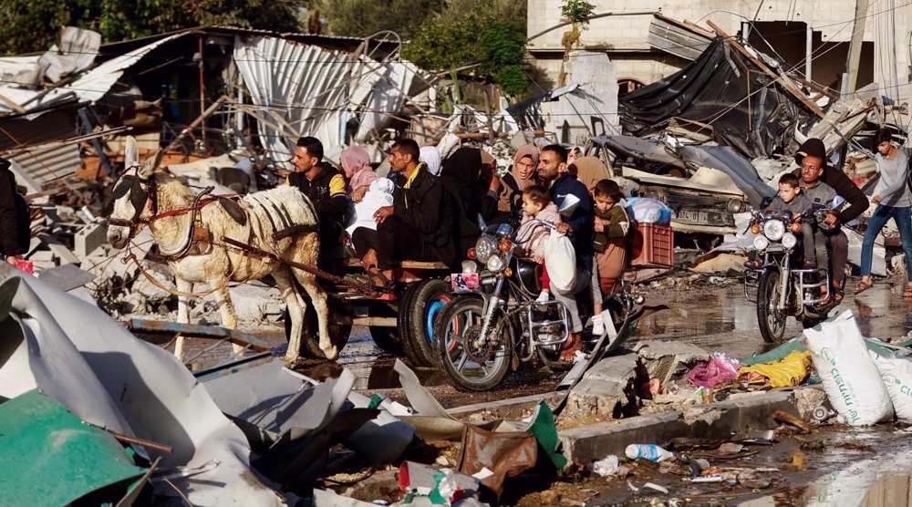 Israeli troops fire at Gazans returning home, kill two after ceasefire 