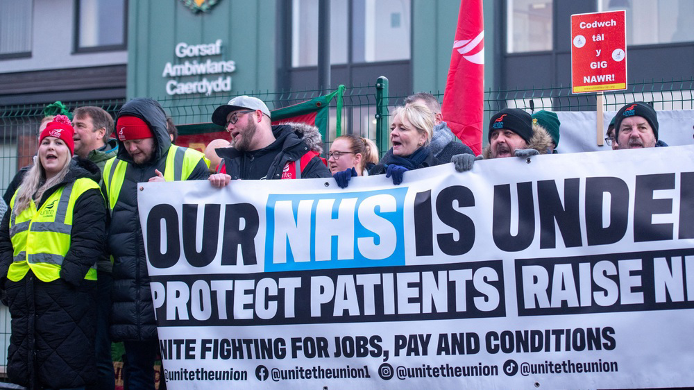 UK ambulance, university staff walk out again over low pay