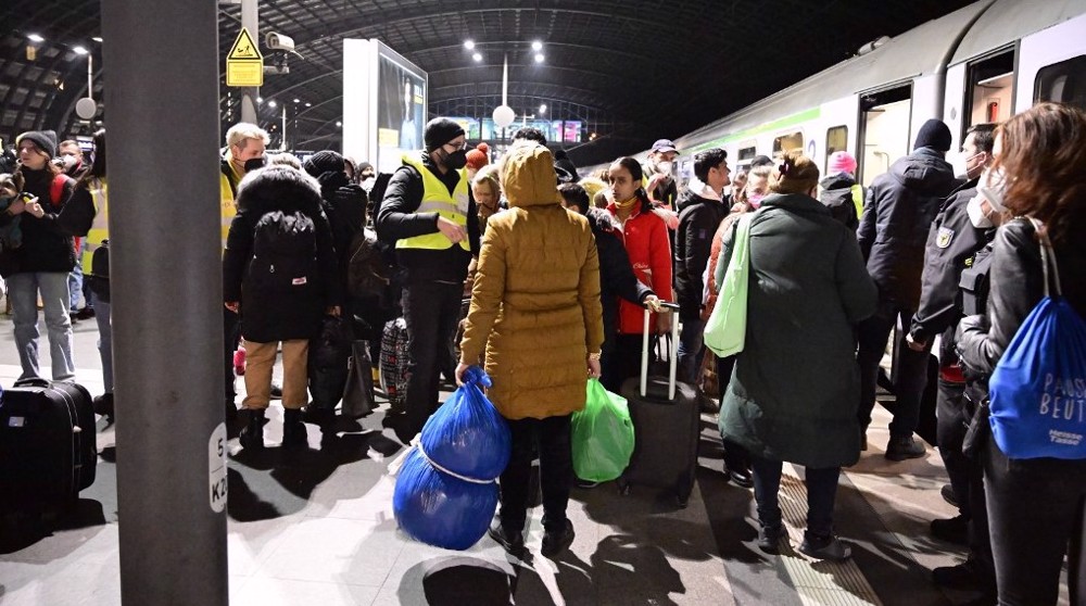 Overwhelmed German officials clash over Ukraine refugees at summit
