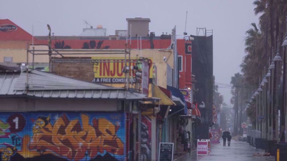 Thousands without power as California storms bring rain, snow and cold