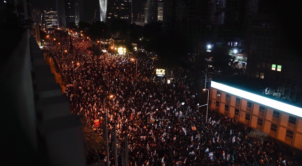 Thousands of protesters call Israel's new cabinet 'threat to world peace'