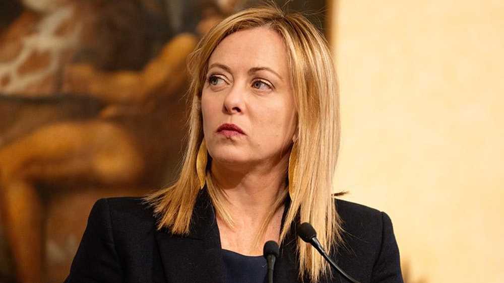 Italian PM under attack as she meets families of migrant shipwreck victims