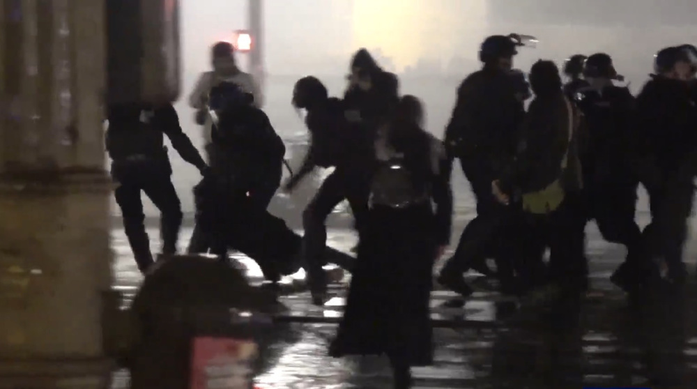 French police attack Paris protesters as anti-pension bill protests rage
