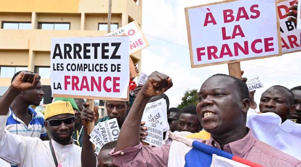 Protests greet Macron on Africa tour, Burkina Faso scraps military pact