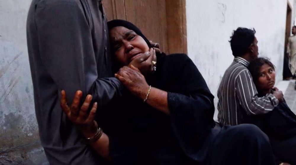 Eleven killed in stampede for food aid in southern Pakistan