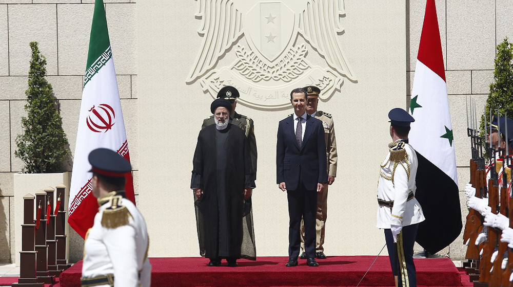 Iran’s President arrives in Syria for historic visit