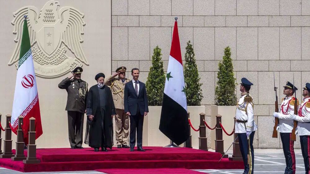 Iran’s president in Syria on official two-day historic visit