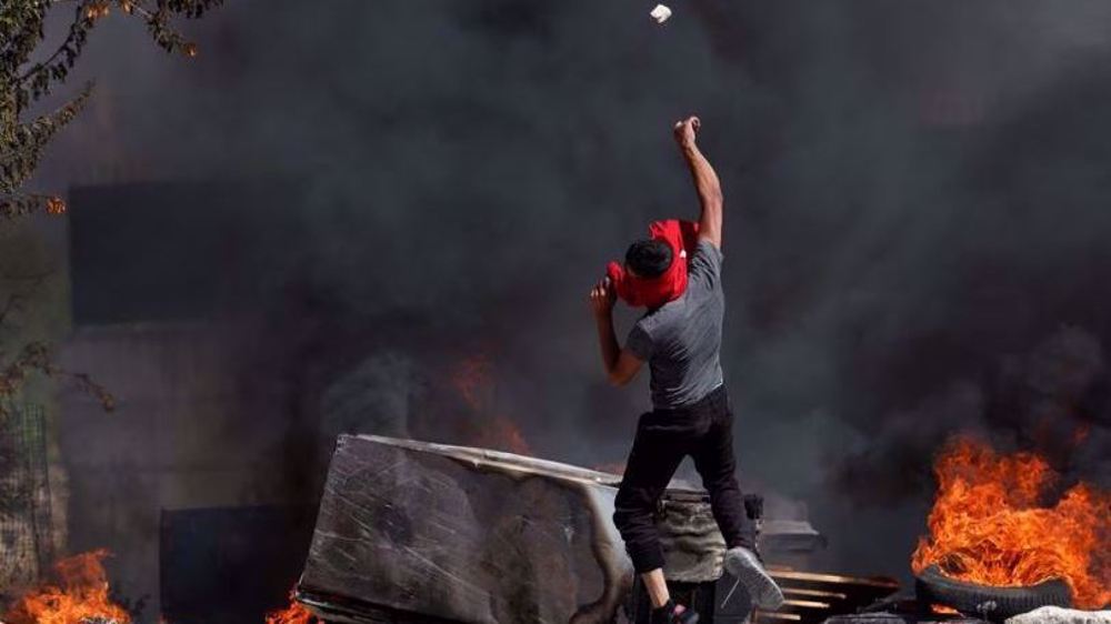 Armed Israeli settlers torch Palestinians' homes, vehicles in attack on West Bank village