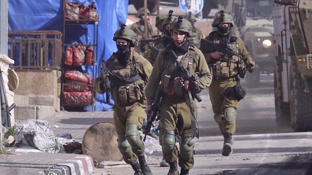 Israeli forces shoot Palestinian journalist covering home demolition in Ramallah 
