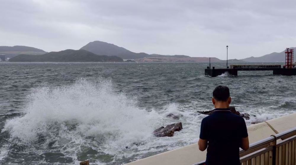 Thousands evacuated as typhoon pummels southern China, Vietnam