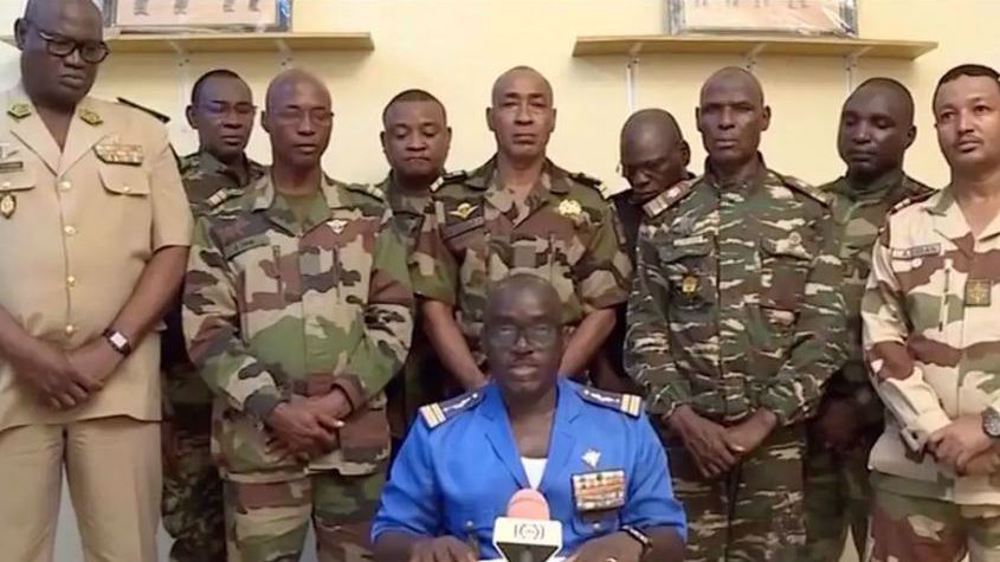 Niger's army supports coup group but president defiant  