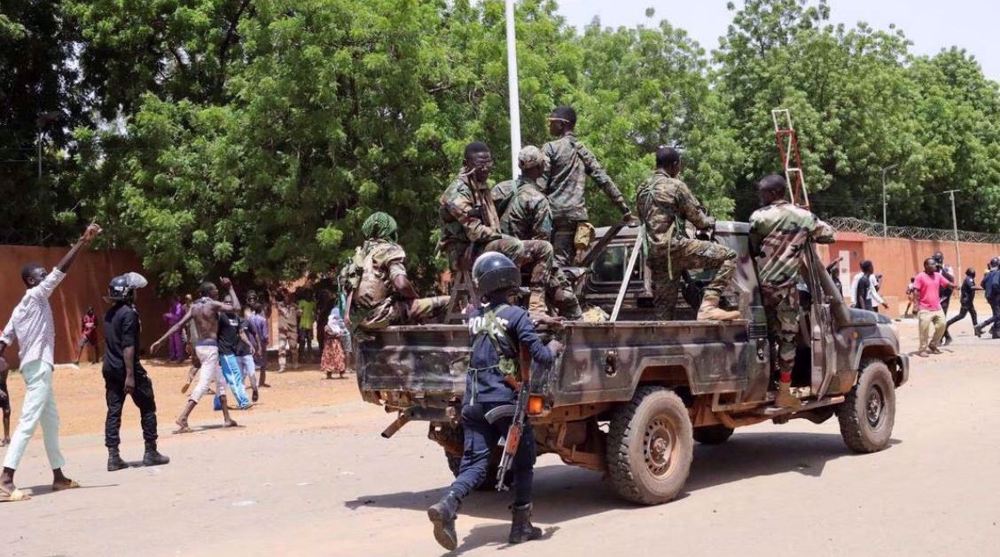 African bloc threatens Niger's junta to cede power or face force 