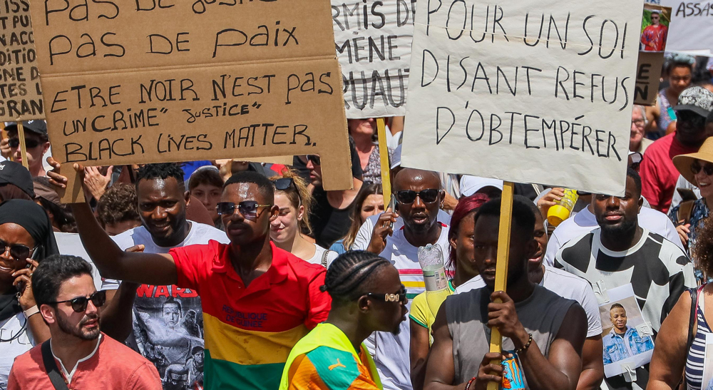French protesters defy govt. ban to rally against police brutality