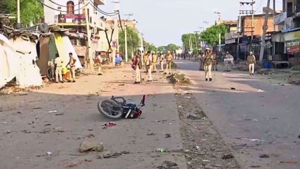 Extremist Hindus set mosque on fire, shoot dead Imam in India