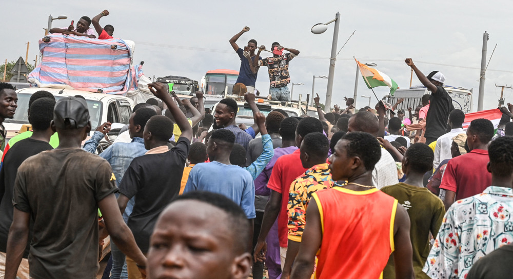 Thousands of protesters surround French army base in Niger