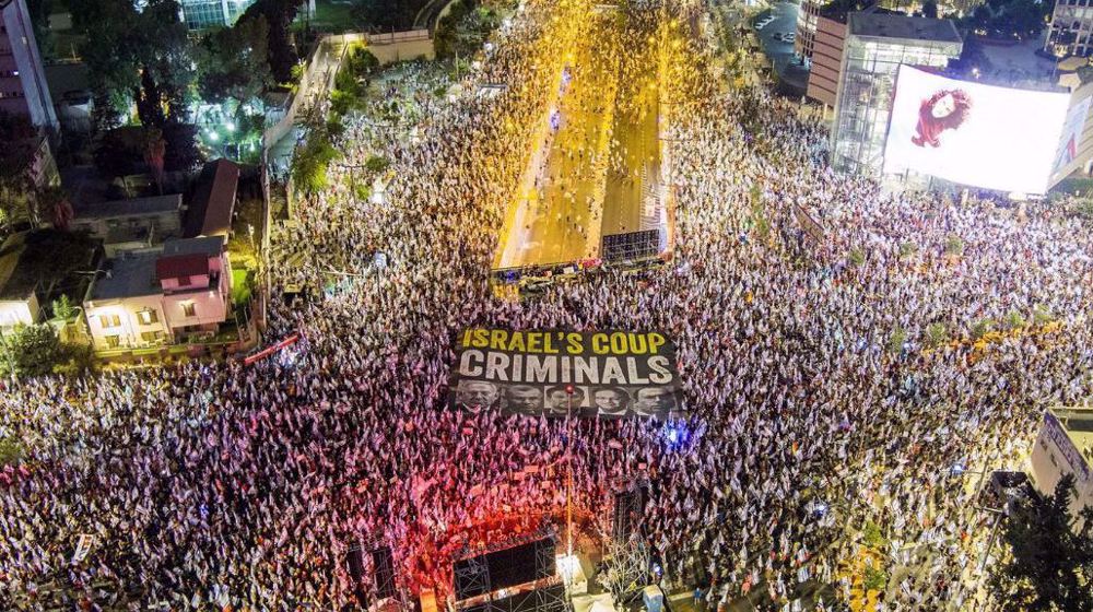 Protesters rally in their thousands against Israeli cabinet's policies for 32nd week 