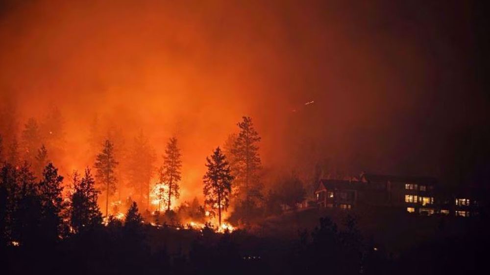 British Columbia wildfires intensify, doubling evacuations to over 35,000