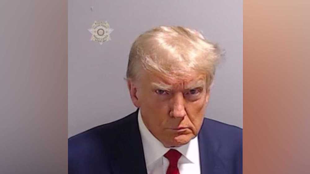 Le cliché judiciaire historique de Trump approfondit la division politique 