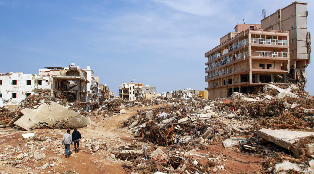 Rescue workers search in rubble for Libya's flood-stricken victims