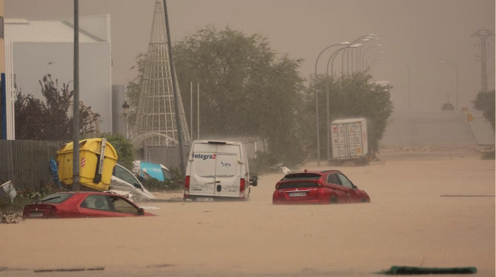 Three dead, three missing after downpours in Spain cause widespread floods