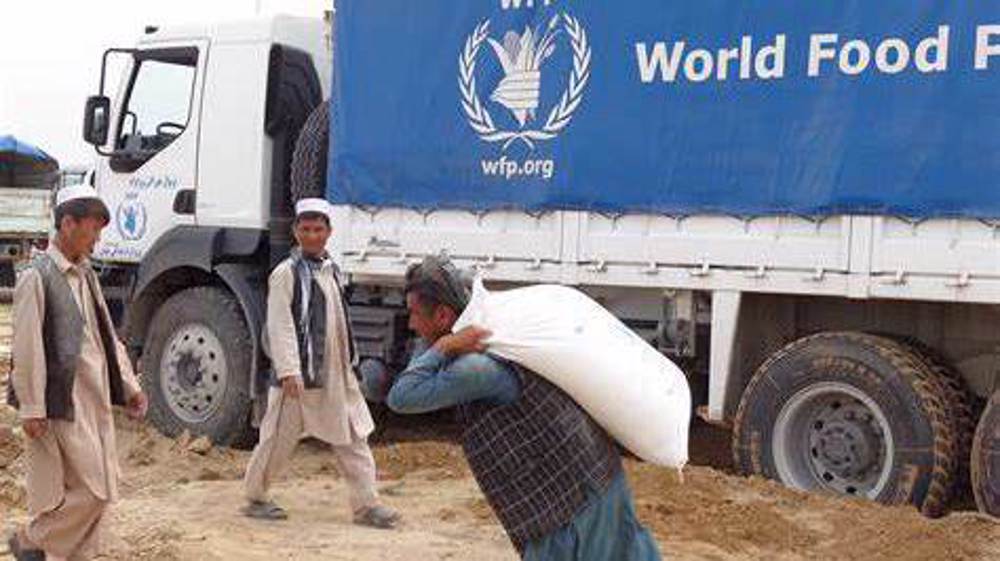 UN food agency has to cut food aid for 2 million more Afghans