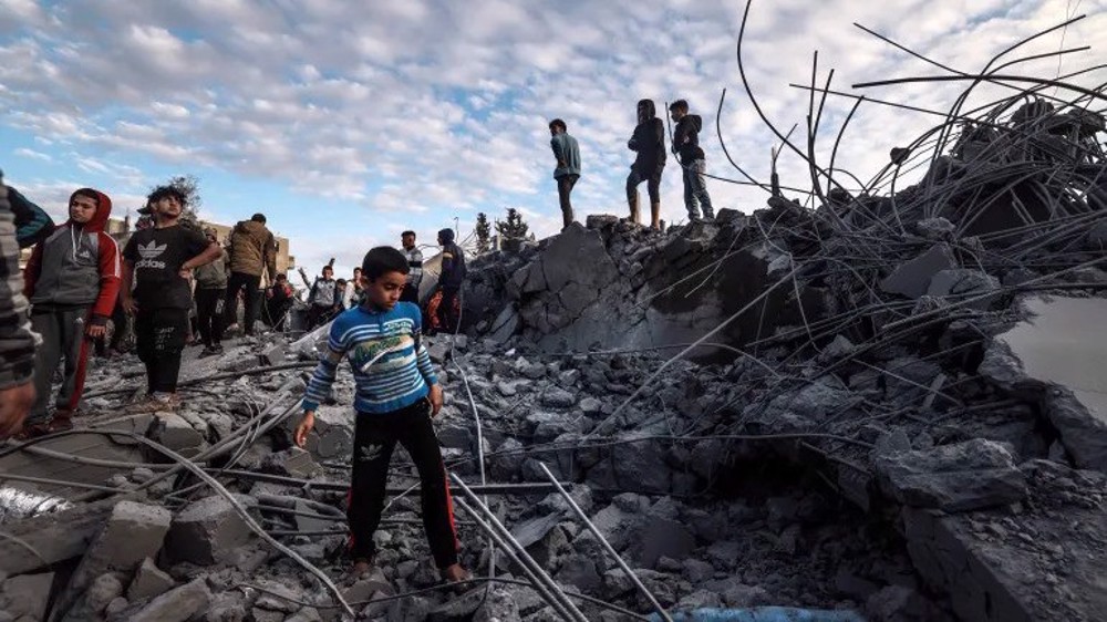 Israel kills dozens of Palestinians lining up for food in Khan Younis 
