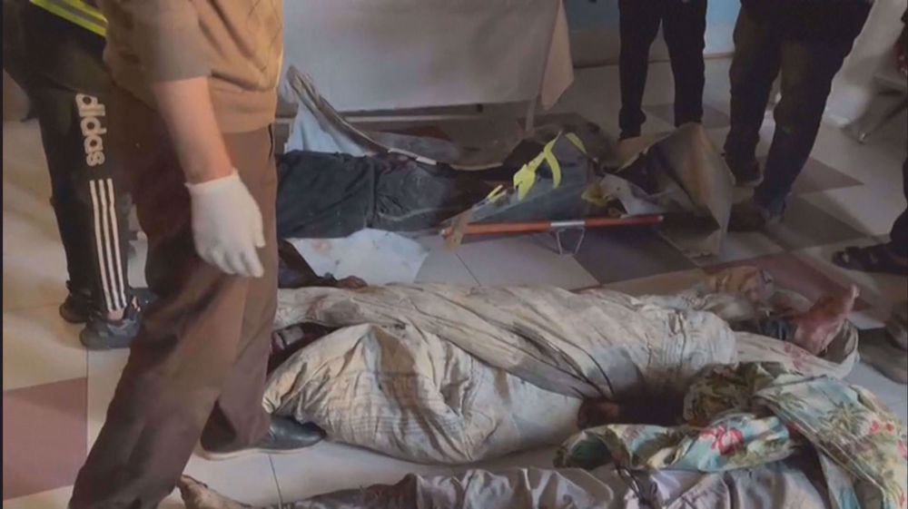 Bodies lined up after strike in Gaza City