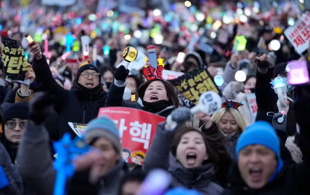 South Korean MPs vote to impeach president over martial law
