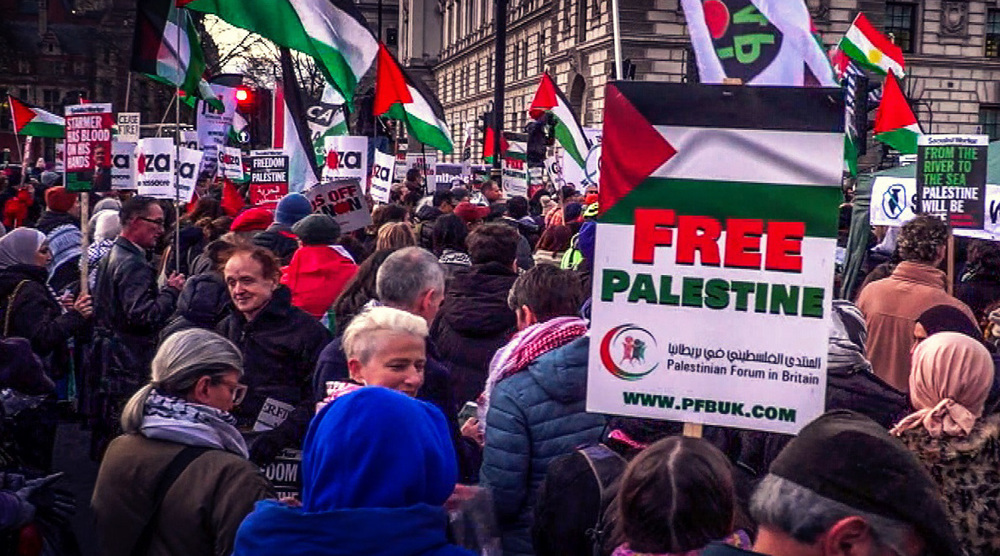 London rally for Palestine ends with flowers, toys at gates of Downing Street