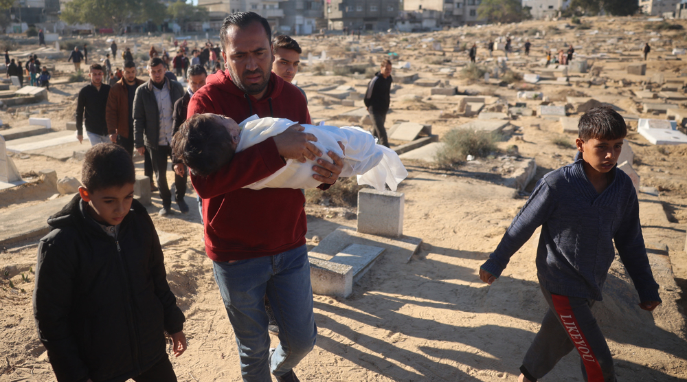 Israel kills dozens of Palestinians in raids on homes, schools across Gaza