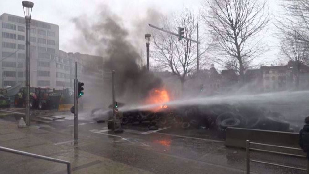 Farmers set fire to tires, protest on sidelines of EU agriculture ministers meeting