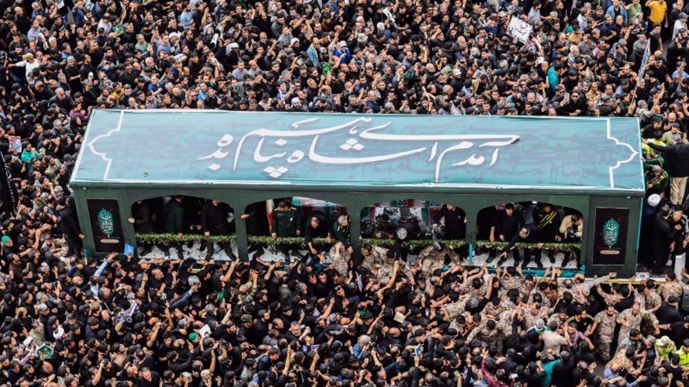 President Raeisi laid to rest at Imam Reza (AS) Shrine