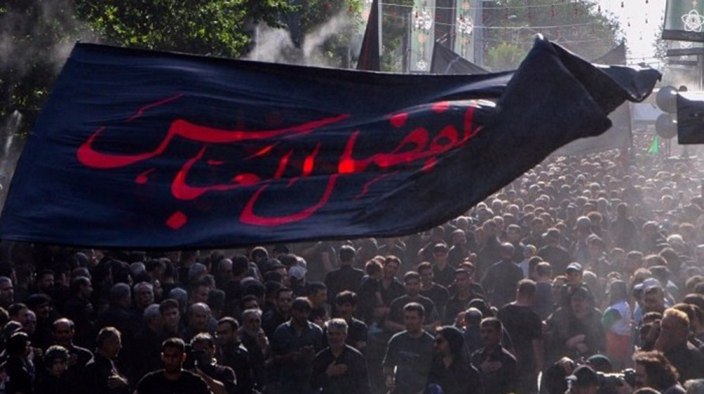 Mourners observe Tasu'a commemorating Imam Hussain's martyrdom